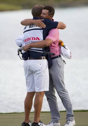 28 February 2016: Adam Scott hugs his caddie David Clark after winning the final round of the Honda Classic at the PGA Golf Herren National Resort & Spa in Palm Beach Gardens, FL. (Photo by Doug Murray Icon Sportswire) GOLF: FEB 28 PGA - The Honda Classic - Final Round Icon796160228016 EDITORIAL USE ONLY