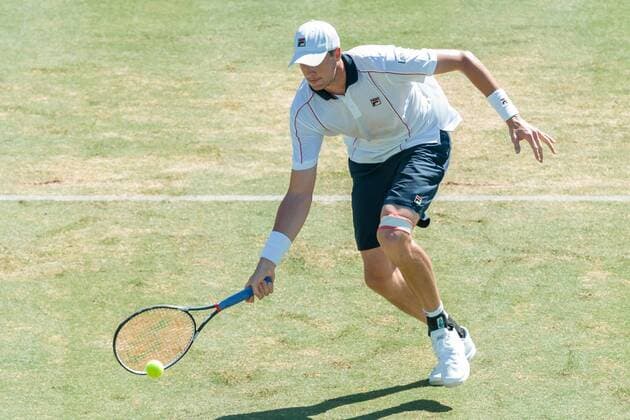 March 4, 2016: John Isner of the USA in action against Sam Groth of Australia during match one of the BNP Paribas Davis Cup World Group first round tie between Australia and USA at Kooyong tennis club in Melbourne, Australia. Tennis 2016: Davis Cup AUS v USA Day 1 - ZUMAc04_