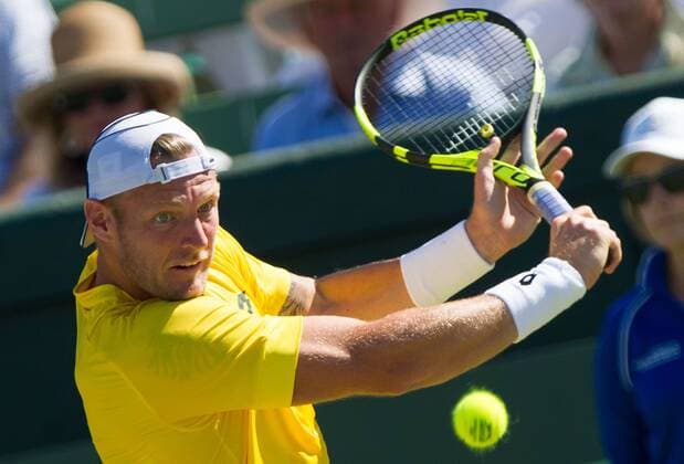 (160304) -- MELBOURNE, March 4, 2016 -- Sam Groth of Australia returns the ball during his men s single match against John Isner of USA during Davis Cup by BNP Paribas World Group first round tie between Australia and USA at Kooyong Lawn Tennis Club in Melbourne, Australia, March 4, 2016. John Isner won 3-0. ) (SP)AUSTRALIA-MELBOURNE-TENNIS-DAVIS CUP BaixXue 