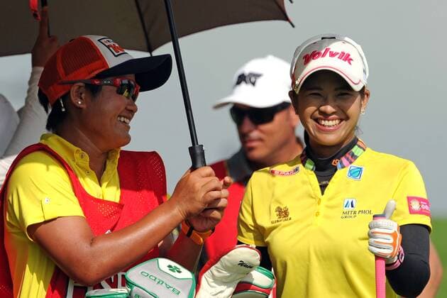 (160304) -- SINGAPORE, March 4, 2016 -- Thailand s player Pornanong Phatlum (R) reacts during the HSBC Women s Champions held at Singapore s Sentosa Golf Club on March 4, 2016. The HSBC Women s Champions enters the second day of competition on Friday. ) (SP)SINGAPORE-GOLF-HSBC WOMEN S CHAMPIONS ThenxChihxWey 