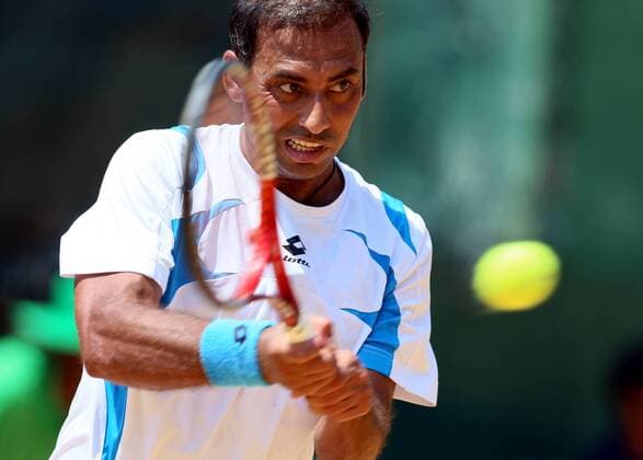 (160304) -- COLOMBO, March 4, 2016 -- Aqeel Khan of Pakistan returns a shot during his men s single match against Zhang Ze of China during their Davis Cup World Asia Oceania Zone Group l first round single tennis match in Colombo, Sri Lanka, on March 4, 2016. Zhang won 3-0. ) (SP)SRI LANKA-COLOMBO-TENNIS-DAVIS CUP LixPeng 