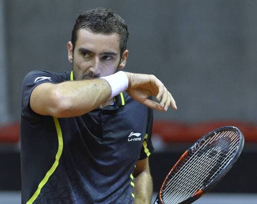 Croatian Marin Cilic reacts during the first game, a single game between Belgian Kimmer Coppejans ATP Tennis Herren 122) and Croatian Marin Cilic (ATP 12) on the first day of the Davis Cup first round World Group meeting between Belgium and Croatia, Friday 04 March 2016, in Angleur, Liege. The first round will be played from 04 to 06 March 2016, Liege. BENOITxDOPPAGNE  x04804342x