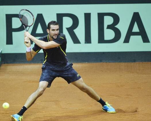 Croatian Marin Cilic pictured in action during the first game, a single game between Belgian Kimmer Coppejans ATP Tennis Herren 122) and Croatian Marin Cilic (ATP 12) on the first day of the Davis Cup first round World Group meeting between Belgium and Croatia, Friday 04 March 2016, in Angleur, Liege. The first round will be played from 04 to 06 March 2016, Liege. BENOITxDOPPAGNE  x04804352x