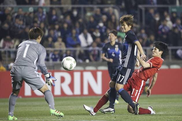 OSAKA, JAPAN - MARCH 04: (CHINA OUT) Wang Shanshan 11 of China and Tanaka Asuna 17 of Japan compete for the ball during the AFC Women s Olympic Final Qualification Round match between Japan and China at Kincho Stadium on March 4, 2016 in Osaka, Japan.  CFP480616792 