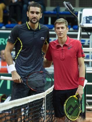 Croatian Marin Cilic and Belgian Kimmer Coppejans pictured ahead of the first game, a single game between Belgian Kimmer Coppejans ATP Tennis Herren 122) and Croatian Marin Cilic (ATP 12) on the first day of the Davis Cup first round World Group meeting between Belgium and Croatia, Friday 04 March 2016, in Angleur, Liege. The first round will be played from 04 to 06 March 2016, Liege. BENOITxDOPPAGNE  x04804405x