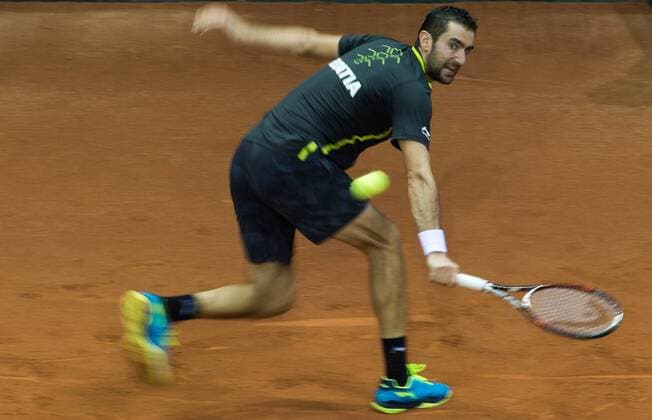 Croatian Marin Cilic performs during the first game, a single game between Belgian Kimmer Coppejans ATP Tennis Herren 122) and Croatian Marin Cilic (ATP 12) on the first day of the Davis Cup first round World Group meeting between Belgium and Croatia, Friday 04 March 2016, in Angleur, Liege. The first round will be played from 04 to 06 March 2016, Liege. BENOITxDOPPAGNE  x04804468x