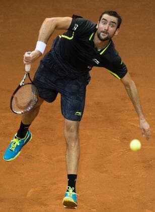 Croatian Marin Cilic performs during the first game, a single game between Belgian Kimmer Coppejans ATP Tennis Herren 122) and Croatian Marin Cilic (ATP 12) on the first day of the Davis Cup first round World Group meeting between Belgium and Croatia, Friday 04 March 2016, in Angleur, Liege. The first round will be played from 04 to 06 March 2016, Liege. BENOITxDOPPAGNE  x04804470x