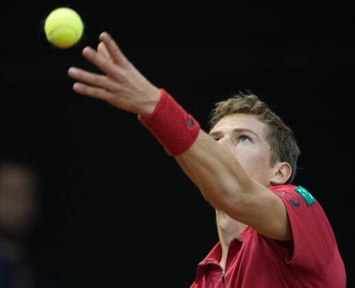 Belgian Kimmer Coppejans performs during the first game, a single game between Belgian Kimmer Coppejans ATP Tennis Herren 122) and Croatian Marin Cilic (ATP 12) on the first day of the Davis Cup first round World Group meeting between Belgium and Croatia, Friday 04 March 2016, in Angleur, Liege. The first round will be played from 04 to 06 March 2016, Liege. BENOITxDOPPAGNE  x04804447x