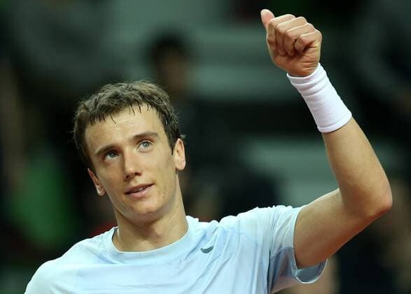KAZAN, RUSSIA. MARCH 4, 2016. Russia s Andrei (Andrey) Kuznetsov celebrates in a Davis Cup Group I Europe Africa Zone 1st Round tennis match against Sweden at Kazan Tennis Academy. Russia won 4-6, 6-1, 6-1, 6-4. Yegor Aleyev TASS  TS01893A