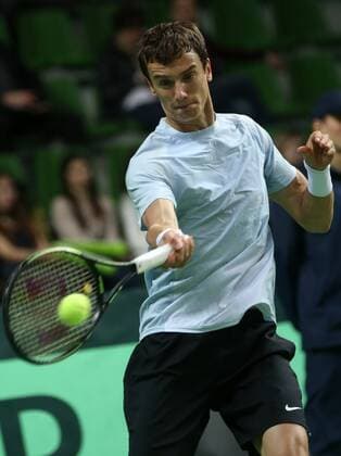 KAZAN, RUSSIA. MARCH 4, 2016. Russia s Andrei (Andrey) Kuznetsov returns a ball in a Davis Cup Group I Europe Africa Zone 1st Round tennis match against Sweden at Kazan Tennis Academy. Russia won 4-6, 6-1, 6-1, 6-4. Yegor Aleyev TASS  TS018934