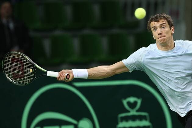 KAZAN, RUSSIA. MARCH 4, 2016. Russia s Andrei (Andrey) Kuznetsov returns a ball in a Davis Cup Group I Europe Africa Zone 1st Round tennis match against Sweden at Kazan Tennis Academy. Russia won 4-6, 6-1, 6-1, 6-4. Yegor Aleyev TASS  TS01891E