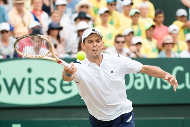 March 5, 2016: Mike Bryan of USA in action against Lleyton Hewitt and John Peers of Australia during the doubles match of the BNP Paribas Davis Cup World Group first round tie between Australia and USA at Kooyong tennis club in Melbourne, Australia. Tennis 2016: Davis Cup AUS v USA Day 2 - ZUMAc04_
