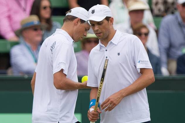 (160305) -- MELBOURNE, March 5, 2016 -- Bob Bryan talks with Mike Bryan of USA in their men s doubles match against Lleyton Hewitt and John Peers of Australia during Davis Cup by BNP Paribas World Group first round tie between Australia and USA at Kooyong Lawn Tennis Club in Melbourne, Australia, on March 5, 2016. Bryan brothers won 3-2, giving USA a 2-1 lead over Australia. ) (SP)AUSTRALIA-MELBOURNE-TENNIS-DAVIS CUP BaixXue 