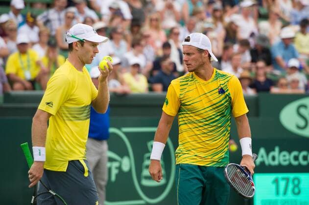 (160305) -- MELBOURNE, March 5, 2016 -- Lleyton Hewitt (R) and John Peers of Australia react during their men s doubles match against Bob Bryan and Mike Bryan of USA during Davis Cup by BNP Paribas World Group first round tie between Australia and USA at Kooyong Lawn Tennis Club in Melbourne, Australia, on March 5, 2016. Bryan brothers won 3-2, giving USA a 2-1 lead over Australia. ) (SP)AUSTRALIA-MELBOURNE-TENNIS-DAVIS CUP BaixXue 