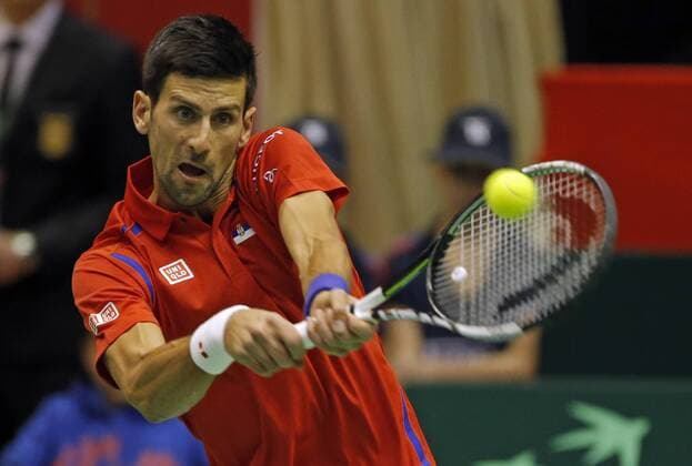 (160305) -- Belgrade, March 5, 2016 -- Serbia s Novak Djokovic returns a shot to Kazakhstan s Aleksandr Nedovyesov during the Davis Cup World Group first round single match between Serbia and Kazakhstan in Belgrade, on March 4, 2016. Djokovic won 3-0. ) (SP)SERBIA-BELGRADE-TENNIS-DAVIS CUP-SERBIA VS KAZAKHSTAN PredragxMilosavljevic 