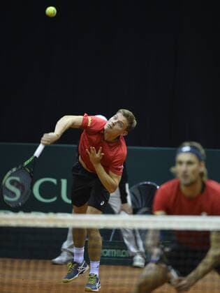 Belgian David Goffin and Belgian Ruben Bemelmans pictured during the third game, a double game between Belgians David Goffin and Ruben Bemelmans and Croatians Ivan Dodig and Franko Skugor, on the second day of the Davis Cup first round World Group meeting between Belgium and Croatia, Saturday 05 March 2016, in Angleur, Liege. BENOITxDOPPAGNE  x04804968x