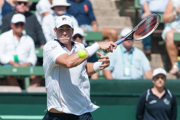 March 6, 2016: John Isner of USA in action against Bernard Tomic of Australia during the first reverse single match of the BNP Paribas Davis Cup World Group first round tie between Australia and USA at Kooyong tennis club in Melbourne, Australia. Tennis 2016: Davis Cup AUS v USA Day 3 - ZUMAc04_