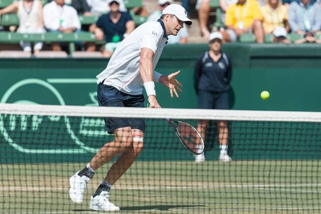 March 6, 2016: John Isner of USA in action against Bernard Tomic of Australia during the first reverse single match of the BNP Paribas Davis Cup World Group first round tie between Australia and USA at Kooyong tennis club in Melbourne, Australia. Tennis 2016: Davis Cup AUS v USA Day 3 - ZUMAc04_