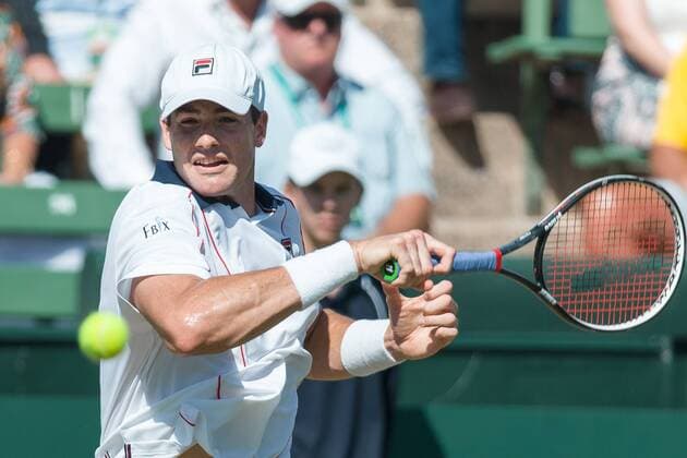March 6, 2016: John Isner of USA in action against Bernard Tomic of Australia during the first reverse single match of the BNP Paribas Davis Cup World Group first round tie between Australia and USA at Kooyong tennis club in Melbourne, Australia. Tennis 2016: Davis Cup AUS v USA Day 3 - ZUMAc04_