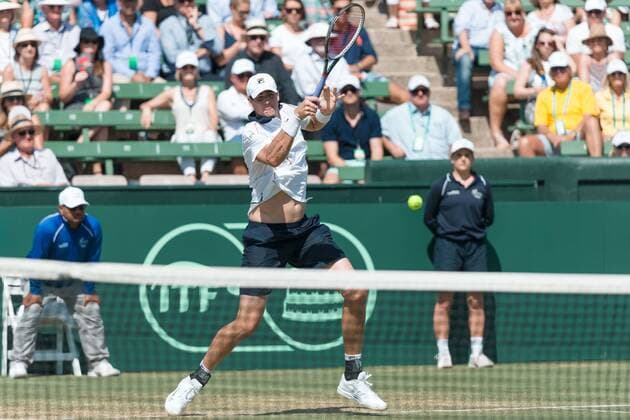 March 6, 2016: John Isner of USA in action against Bernard Tomic of Australia during the first reverse single match of the BNP Paribas Davis Cup World Group first round tie between Australia and USA at Kooyong tennis club in Melbourne, Australia. Tennis 2016: Davis Cup AUS v USA Day 3 - ZUMAc04_