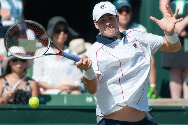 March 6, 2016: John Isner of USA in action against Bernard Tomic of Australia during the first reverse single match of the BNP Paribas Davis Cup World Group first round tie between Australia and USA at Kooyong tennis club in Melbourne, Australia. Tennis 2016: Davis Cup AUS v USA Day 3 - ZUMAc04_