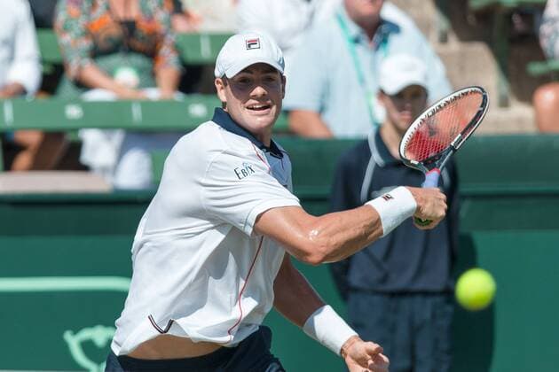 March 6, 2016: John Isner of USA in action against Bernard Tomic of Australia during the first reverse single match of the BNP Paribas Davis Cup World Group first round tie between Australia and USA at Kooyong tennis club in Melbourne, Australia. Tennis 2016: Davis Cup AUS v USA Day 3 - ZUMAc04_