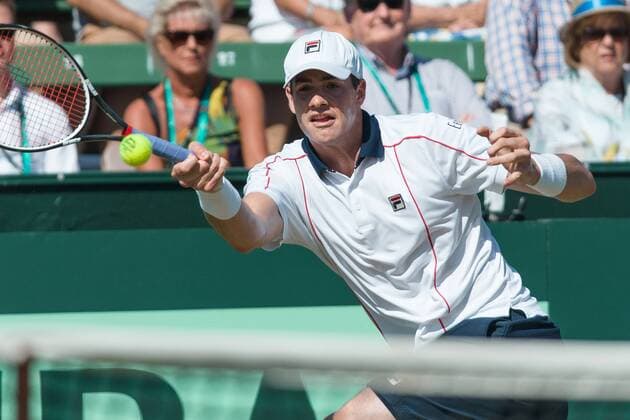 March 6, 2016: John Isner of USA in action against Bernard Tomic of Australia during the first reverse single match of the BNP Paribas Davis Cup World Group first round tie between Australia and USA at Kooyong tennis club in Melbourne, Australia. Tennis 2016: Davis Cup AUS v USA Day 3 - ZUMAc04_