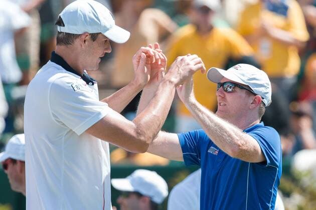 March 6, 2016: John Isner and Jim Courier of USA celebrate winning the first reverse single match against Bernard Tomic of Australia at the BNP Paribas Davis Cup World Group first round tie between Australia and USA at Kooyong tennis club in Melbourne, Australia. USA won in 4 sets. Tennis 2016: Davis Cup AUS v USA Day 3 - ZUMAc04_