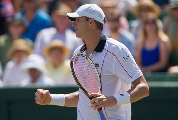 (160306) -- MELBOURNE, Mar. 6, 2016 -- John Isner of USA celebrates after winning his men s singles match against Bernard Tomic of Australia during Davis Cup by BNP Paribas World Group first round tie between Australia and USA at Kooyong Lawn Tennis Club in Melbourne, Australia, Mar. 6, 2016. John Isner won 3-1, making USA won Australia with 3-1. ) (SP)AUSTRALIA-MELBOURNE-TENNIS-DAVIS CUP BaixXue 