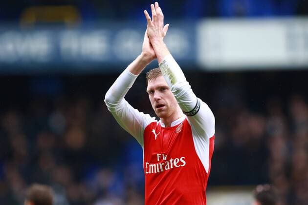 Tottenham Hotspur v Arsenal . . London, UK . . 05.03.2016 Per Mertesacker (A) applauds the fans at the end of the game. 