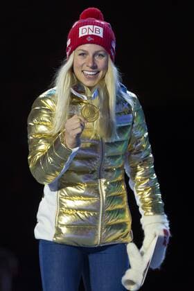 05.03.2016. Oslo Holmenkollen, Oslo, Norway. IBU Biathlon World Cup. Day One. Tiril Eckhoff of Norway first place winner of ladies 7.5km at the medal ceremony during the IBU World Championships Biathlon in Holmenkollen Oslo, Norway. . xNigelxWaldronx  ActionPlus11715025