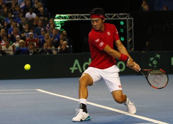 06.03.2016. Barclaycard Arena, Birmingham, England. Davis Cup Tennis World Group First Round. Great Britain versus Japan. Japan s Kei Nishikori hits a backhand during his singles match against Great Britain s Andy Murray on day 3 of the tie. xAlanxMartinx  ActionPlus11715062