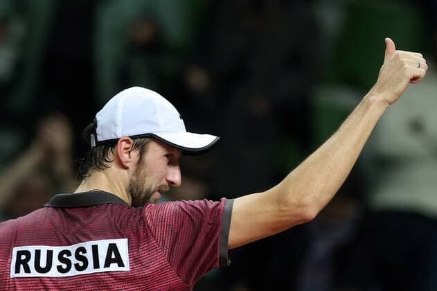 Tennis, Davis Cup, Russland - Schweden KAZAN, RUSSIA. MARCH 6, 2016. Russia s tennis player Konstantin Kravchuk gesures in a Davis Cup Group I Europe Africa Zone 1st Round tennis rubber against Sweden at Kazan Tennis Academy. Kravchuk won 6-2, 6-2. Yegor Aleyev TASS  TS018B49