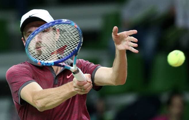 Tennis, Davis Cup, Russland - Schweden KAZAN, RUSSIA. MARCH 6, 2016. Russia s tennis player Konstantin Kravchuk returns the ball in Rubber 5 of the Davis Cup Group I Europe Africa Zone 1st Round tie against Sweden at Kazan Tennis Academy. Kravchuk won 6-2, 6-2. Russia won the tie 5-0. Yegor Aleyev TASS  TS018B46