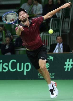 Tennis, Davis Cup, Russland - Schweden KAZAN, RUSSIA. MARCH 6, 2016. Russia s tennis player Konstantin Kravchuk returns the ball in Rubber 5 of the Davis Cup Group I Europe Africa Zone 1st Round tie against Sweden at Kazan Tennis Academy. Kravchuk won 6-2, 6-2. Russia won the tie 5-0. Yegor Aleyev TASS  TS018B3C