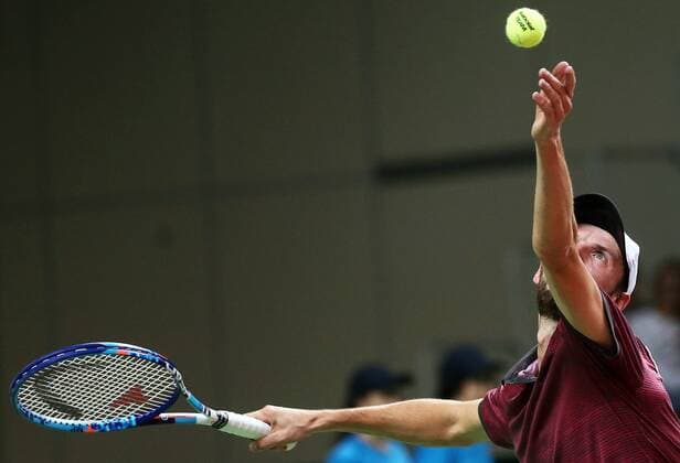 Tennis, Davis Cup, Russland - Schweden KAZAN, RUSSIA. MARCH 6, 2016. Russia s tennis player Konstantin Kravchuk serves in Rubber 5 of the Davis Cup Group I Europe Africa Zone 1st Round tie against Sweden at Kazan Tennis Academy. Kravchuk won 6-2, 6-2. Russia won the tie 5-0. Yegor Aleyev TASS  TS018B3B