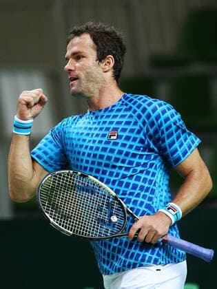 Tennis, Davis Cup, Russland - Schweden KAZAN, RUSSIA. MARCH 6, 2016. Russia s tennis player Teimuraz (Teymuraz) Gabashvili pumps his fist in Rubber 4 of the Davis Cup Group I Europe Africa Zone 1st Round tie against Sweden at Kazan Tennis Academy. Gabashvili won 6-4, 6-0. Russia won the tie 5-0. Yegor Aleyev TASS  TS018B2D