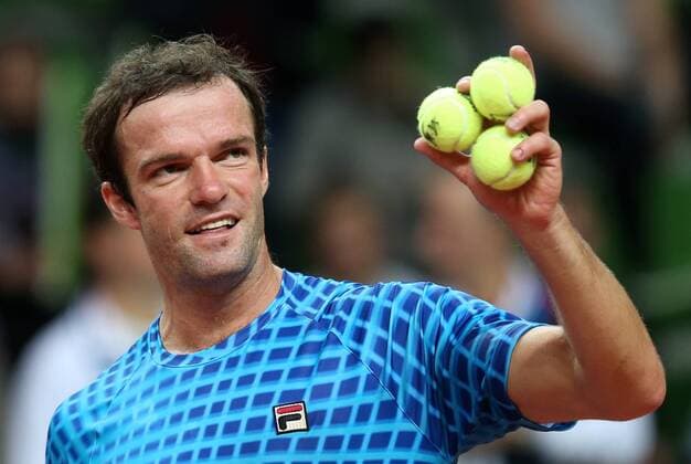 Tennis, Davis Cup, Russland - Schweden KAZAN, RUSSIA. MARCH 6, 2016. Russia s tennis player Teimuraz (Teymuraz) Gabashvili with three tennis balls in hand in Rubber 4 of the Davis Cup Group I Europe Africa Zone 1st Round tie against Sweden at Kazan Tennis Academy. Gabashvili won 6-4, 6-0. Russia won the tie 5-0. Yegor Aleyev TASS  TS018B14