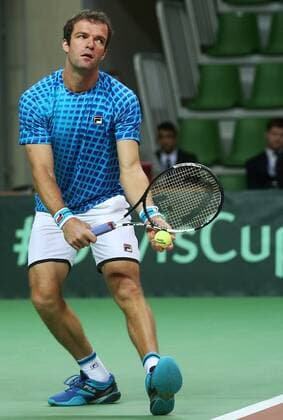 Tennis, Davis Cup, Russland - Schweden KAZAN, RUSSIA. MARCH 6, 2016. Russia s tennis player Teimuraz (Teymuraz) Gabashvili serves in Rubber 4 of the Davis Cup Group I Europe Africa Zone 1st Round tie against Sweden at Kazan Tennis Academy. Gabashvili won 6-4, 6-0. Russia won the tie 5-0. Yegor Aleyev TASS  TS018B0C