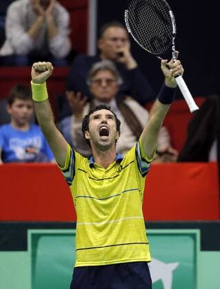 BELGRADE, March 6, 2016 -- Kazakhstan s Mikhail Kukushkin reacts after winning a point against Serbia s Novak Djokovic during the Davis Cup World Group first round match between Serbia and Kazakhstan at Aleksandar Nikolic hall in Belgrade, on March 6, 2016. Djokovic won 3-2. ) (SP)SERBIA-BELGRADE-TENNIS-DAVIS CUP-SERBIA VS KAZAKHSTAN PredragxMilosavljevic 