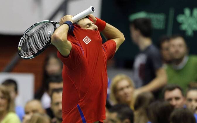 BELGRADE, March 6, 2016 -- Serbia s tennis player Novak Djokovic reacts after losing a point to Kazakhstan s Mikhail Kukushkin during the Davis Cup World Group first round match between Serbia and Kazakhstan at Aleksandar Nikolic hall in Belgrade, on March 6, 2016. Djokovic won 3-2. ) (SP)SERBIA-BELGRADE-TENNIS-DAVIS CUP-SERBIA VS KAZAKHSTAN PredragxMilosavljevic 