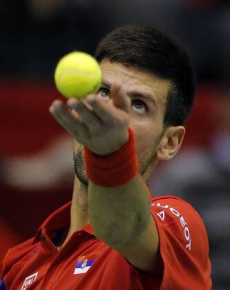 BELGRADE, March 6, 2016 -- Serbia s tennis player Novak Djokovic serves to Kazakhstan s Mikhail Kukushkin during the Davis Cup World Group first round match between Serbia and Kazakhstan at Aleksandar Nikolic hall in Belgrade, on March 6, 2016. Djokovic won 3-2. ) (SP)SERBIA-BELGRADE-TENNIS-DAVIS CUP-SERBIA VS KAZAKHSTAN PredragxMilosavljevic 