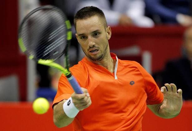BELGRADE, March 6, 2016 -- Serbia s tennis player Viktor Troicki returns the ball to Kazakhstan s Aleksandr Nedovyesov during the Davis Cup World Group first round match between Serbia and Kazakhstan at Aleksandar Nikolic hall in Belgrade, on March 6, 2016. Troicki won 3-0 in the final match and brought overall victory over Kazakhstan. Serbia will compete with Great Britain in quarterfinals scheduled for July 15-17.) (SP)SERBIA-BELGRADE-TENNIS-DAVIS CUP-SERBIA VS KAZAKHSTAN PredragxMilosavljevic 