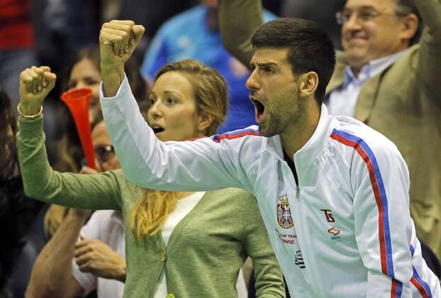 BELGRADE, March 6, 2016 -- Serbia s tennis player Novak Djokovic (R) and his wife Jelena celebrate victory against Kazakhstan s Aleksandr Nedovyesov during the Davis Cup World Group first round match between Serbia and Kazakhstan at Aleksandar Nikolic hall in Belgrade, on March 6, 2016. Troicki won 3-0 in the final match and brought overall victory over Kazakhstan. Serbia will compete with Great Britain in quarterfinals scheduled for July 15-17.) (SP)SERBIA-BELGRADE-TENNIS-DAVIS CUP-SERBIA VS KAZAKHSTAN PredragxMilosavljevic 