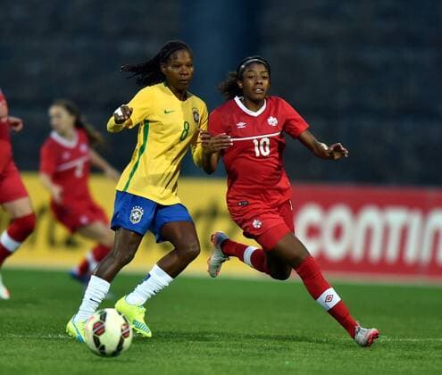 ALBUFEIRA, March 9, 2016 -- Canada s Ashley Lawrence (R) vies with Brazil s Miraildes Mota during the final match of 2016 Algarve Cup women s soccer tournament between Canada and Brazil at the Bela Vista Municipal Stadium in Parchal, Portugal, on March 9, 2016. Canada won 2-1 and thus claimed the title. ) (SP)PORTUGAL-ALBUFEIRA-ALGARVE CUP-CANADA VS BRAZIL ZhangxLiyun 