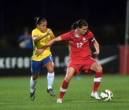 ALBUFEIRA, March 9, 2016 -- Canada s Christine Sinclair (R) vies with Brazil s Debora De Oliveira during the final match of 2016 Algarve Cup women s soccer tournament between Canada and Brazil at the Bela Vista Municipal Stadium in Parchal, Portugal, on March 9, 2016. Canada won 2-1 and thus claimed the title. ) (SP)PORTUGAL-ALBUFEIRA-ALGARVE CUP-CANADA VS BRAZIL ZhangxLiyun 
