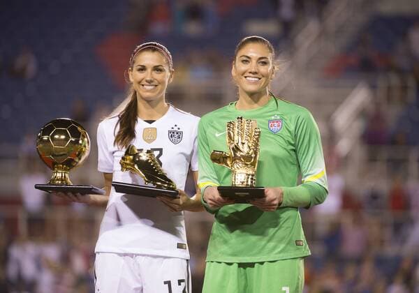 09 March 2016: United States Forward Alex Morgan (13) and United States Goalkeeper Hope Solo (1) smile and hold their Golden Ball, Golden Shoe and Golden Glove trophies after USA won the SheBelieves Cup soccer match against Germany at the FAU Stadium in Boca Raton, Florida. (Photo by Doug Murray Icon Sportswire) SOCCER: MAR 09 Women s - SheBelieves Cup - USA v Germany Icon796160309010 EDITORIAL USE ONLY