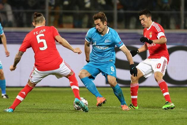 March 9, 2016 - Na - St. Petersburg, 09.03.2016 - Zenit St. Petersburg received tonight Benfica this Petrovsky stadium in match counting for the 2nd leg of the eighth of the Champions League 2015 16. The player of FC Zenit Mauricio (8, blue), the players of FC Benfica Ljubomir Fejsa (5), Nicolas Gaitan (10). AlexanderxKulebyakin 