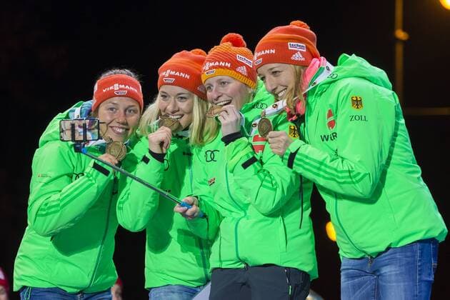 11.03.2016. Holmenkollen, Oslo, Norway. IBU Biathlon World Championships . L-R Laura Dahlmeier of Germany, Maren Hammerschmidt of Franziska Hildebrand of Germany and Franziska Preuss of Germany (bronze medal) at the medal award ceremony during the IBU World Championships Biathlon in Holmenkollen Oslo, Norway. xNigelxWaldronx  ActionPlus11716431