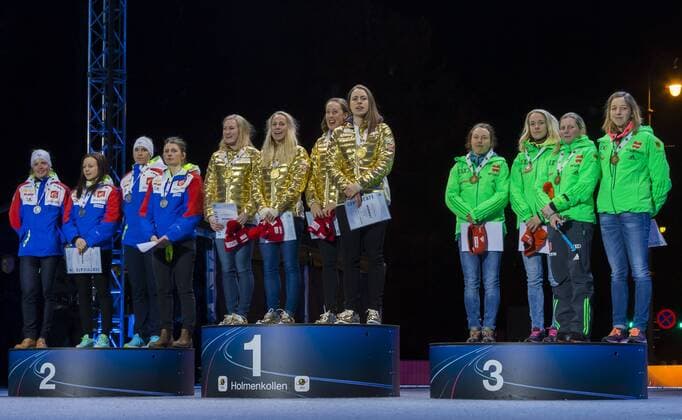 11.03.2016. Holmenkollen, Oslo, Norway. IBU Biathlon World Championships . L-R J Anais Bescond of France, Anais Chevalier of France, Justine Braisaz of France and Marie Dorin Habert of France (silver medal) Marte Olsbu of Norway, Tiril Eckhoff of Norway, Fanny Horm Birkeland of Norway and Synnoeve Solemdal of Norway (gold medal) Laura Dahlmeier of Germany, Maren Hammerschmidt of Franziska Hildebrand of Germany and Franziska Preuss of Germany (bronze medal) at the medal award ceremony during the IBU World Championships Biathlon in Holmenkollen Oslo, Norway. xNigelxWaldronx  ActionPlus11716436